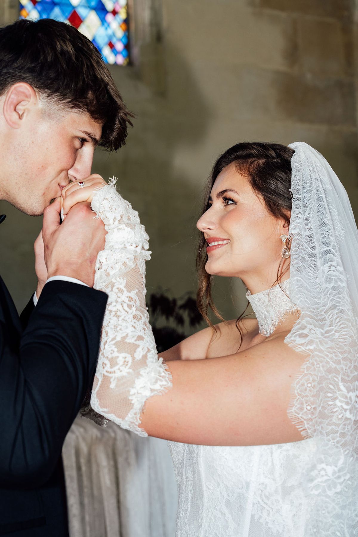 Styled shoot models Harper and Liam: the same hand-kiss moment in colour, Chateau de Mirambeau, spring editorial
