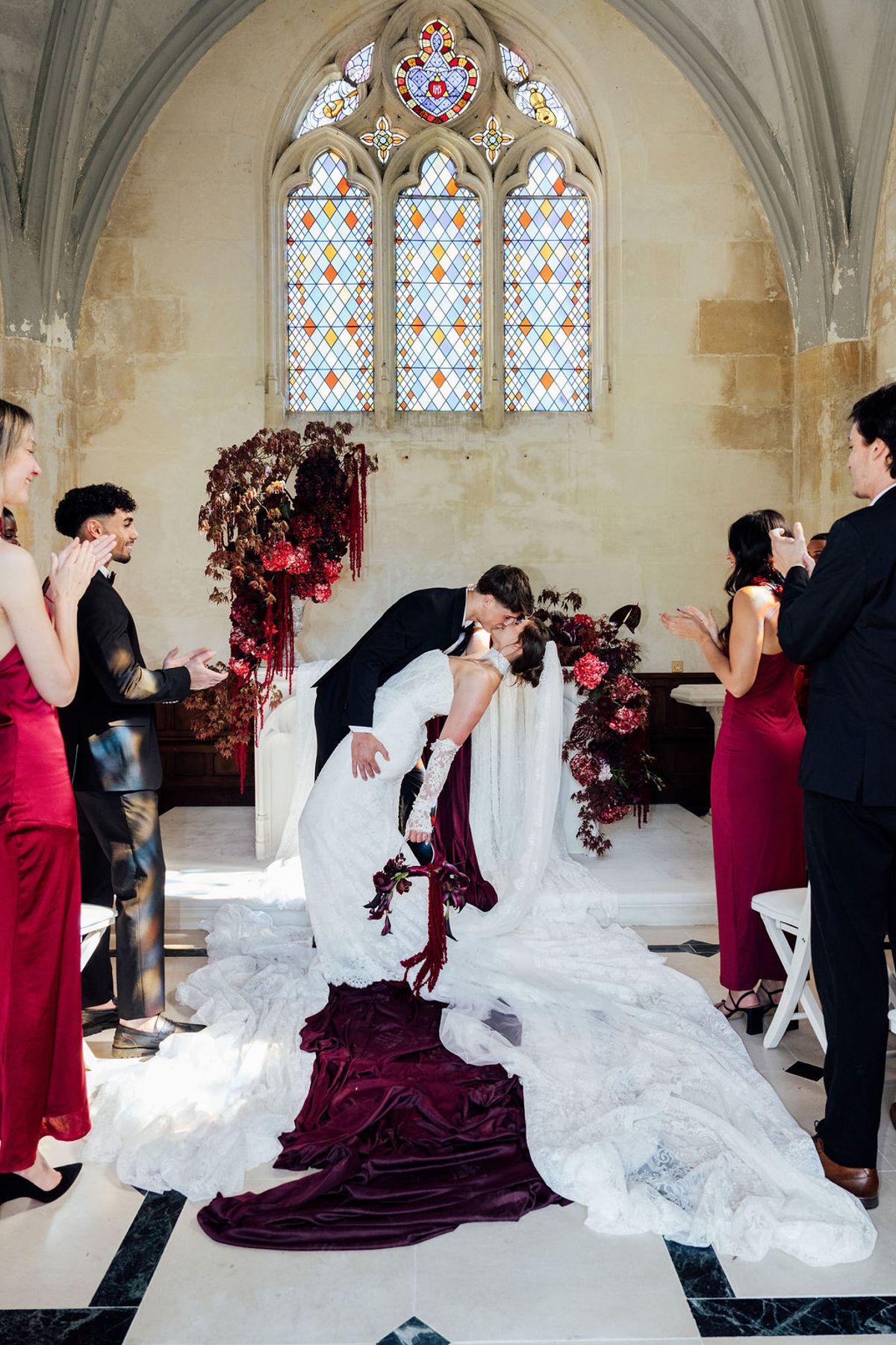 Styled shoot models Harper and Liam: the recessional as guests in burgundy applaud, Chateau de Mirambeau, spring editorial