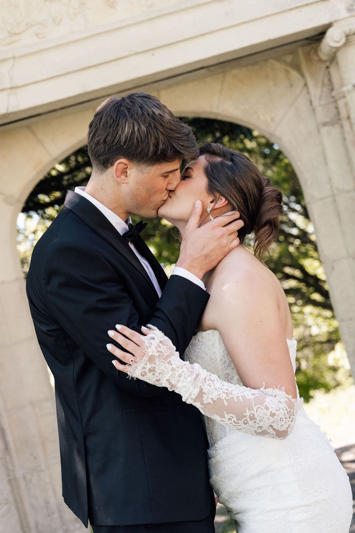 Styled shoot models Harper and Liam: a close outdoor kiss, Chateau de Mirambeau, spring editorial