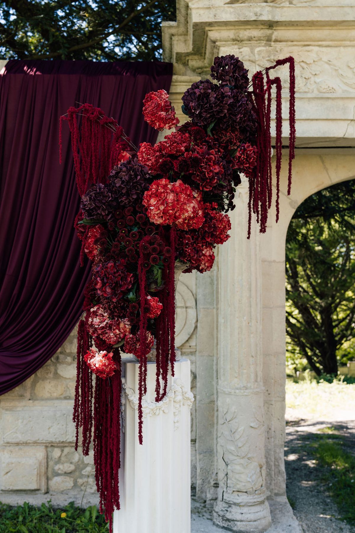 Styled shoot models Harper and Liam: a close study of the trailing floral installation, Chateau de Mirambeau, spring editorial