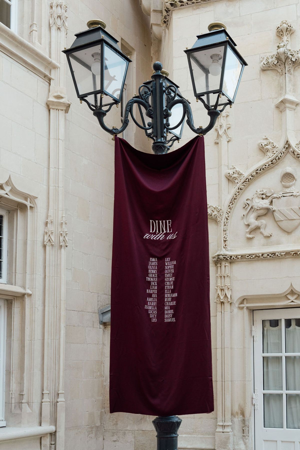 Styled shoot models Harper and Liam: a closer view of the hanging banner, Chateau de Mirambeau, spring editorial