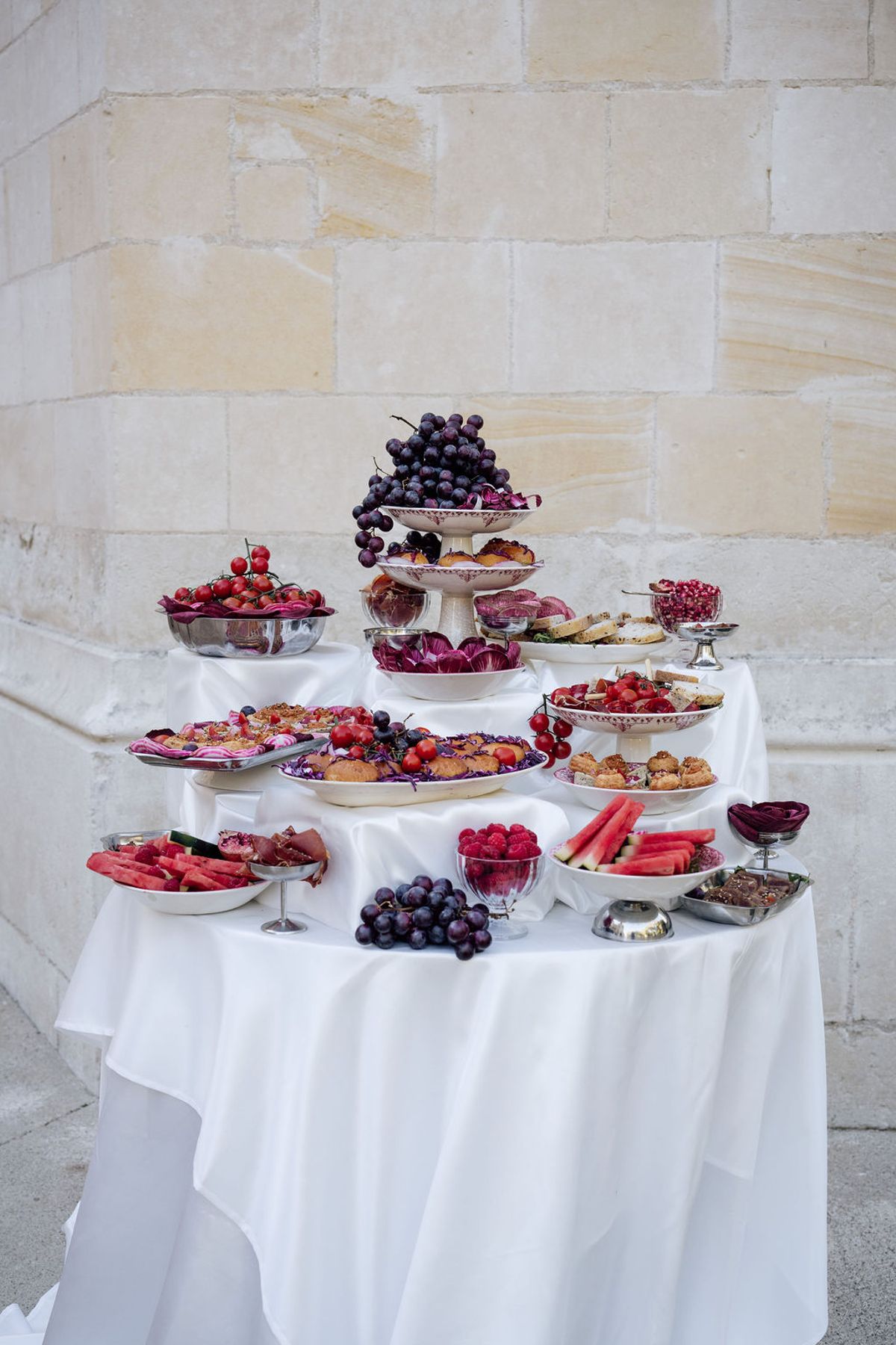 Styled shoot models Harper and Liam: the grazing table shown wide, Chateau de Mirambeau, spring editorial
