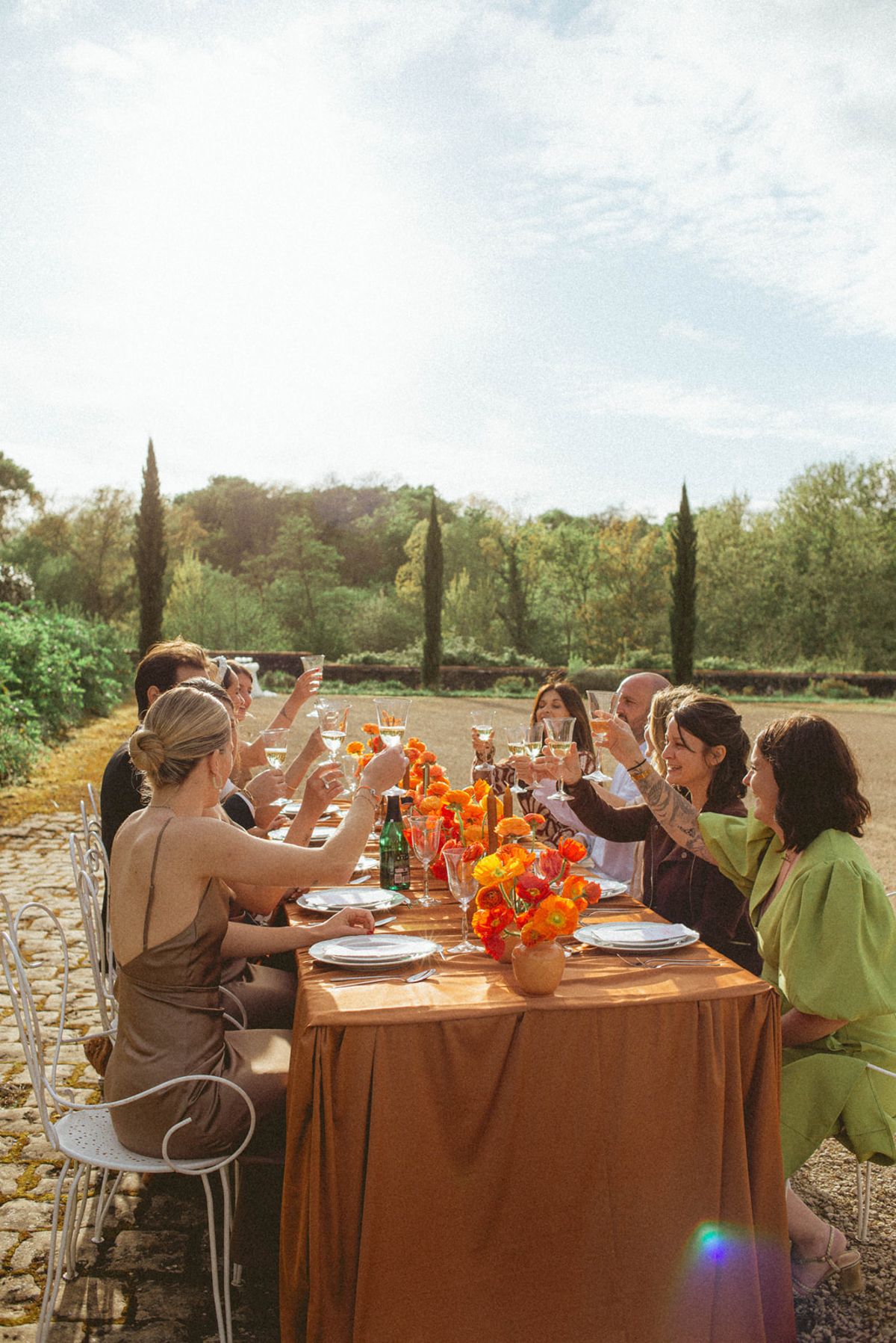 Orange-palette garden reception at Chateau de Campet