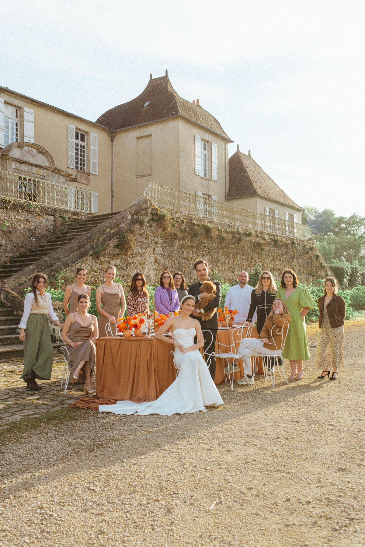 Orange-palette garden reception at Chateau de Campet