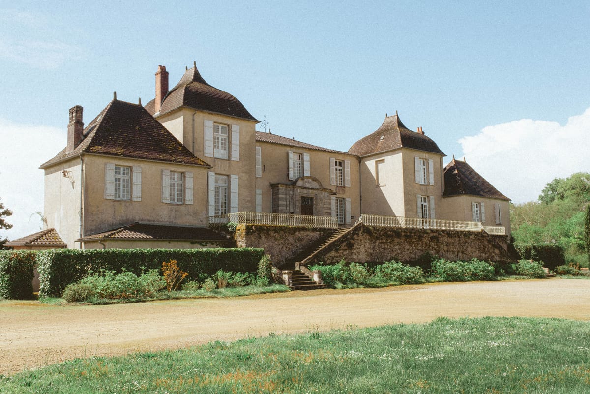 Stone facade and gardens at Chateau de Campet