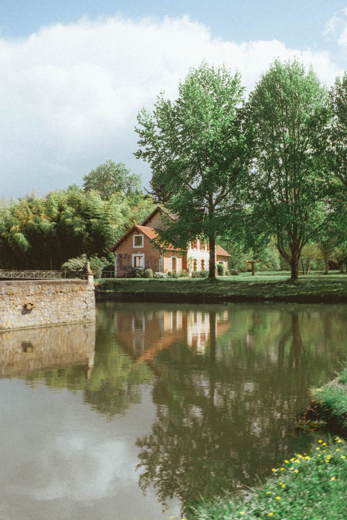 Stone facade and gardens at Chateau de Campet