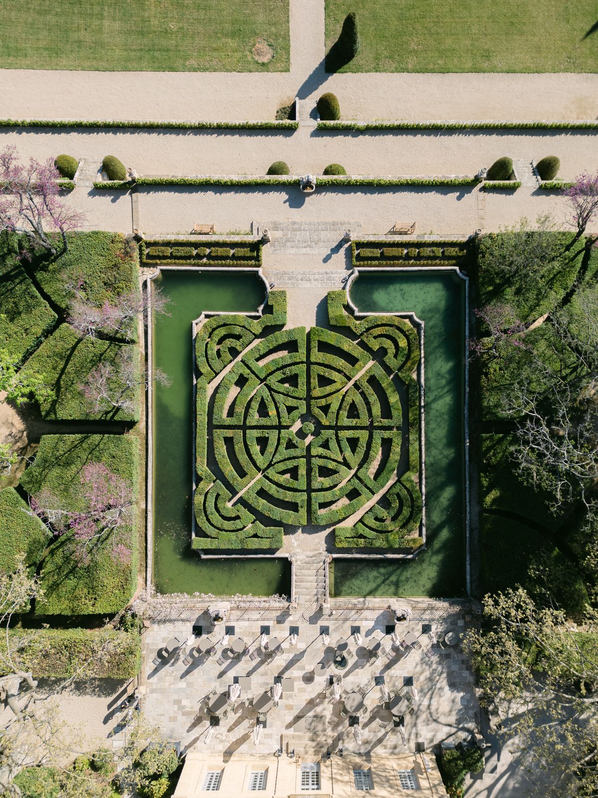 Aerial view of the parterre garden and clipped hedge maze at Chateau de la Gaude