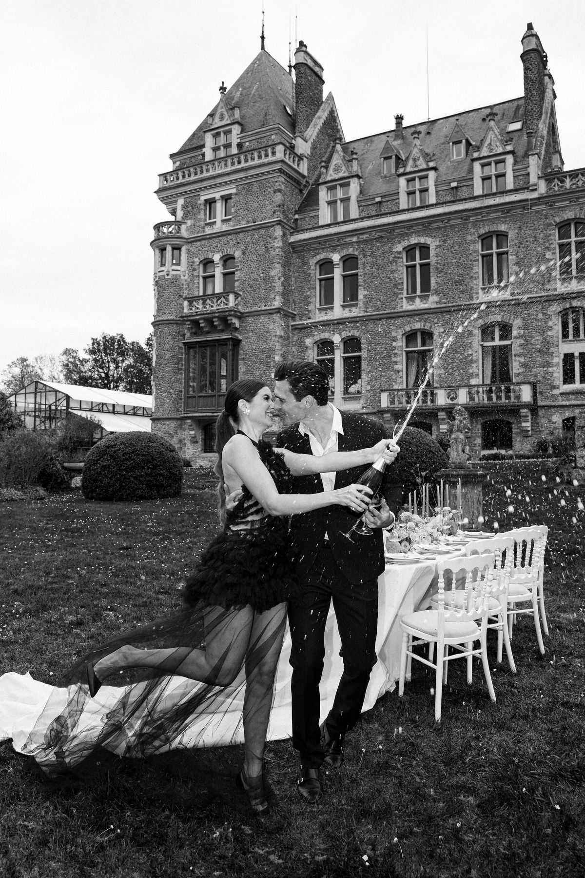 Champagne spray celebration at Château de Méridon, Île-de-France