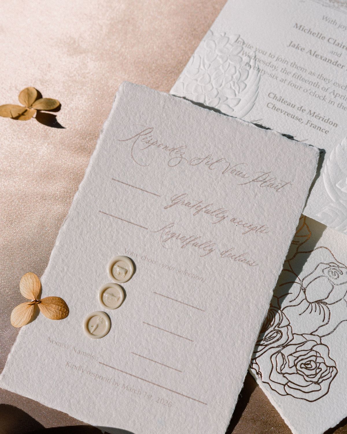 Letterpressed RSVP card flat-lay at Château de Méridon, Île-de-France