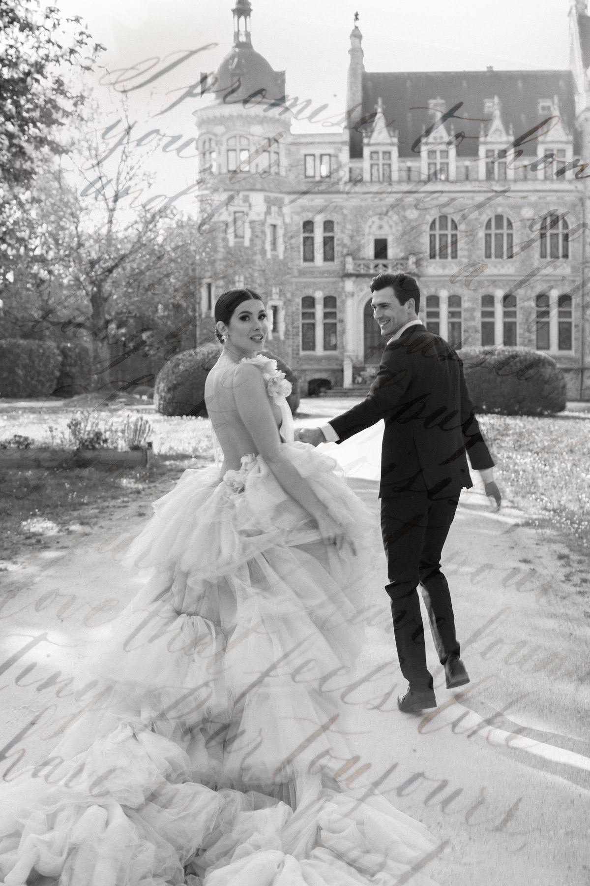 Couple in black and white walking away at Château de Méridon, Île-de-France