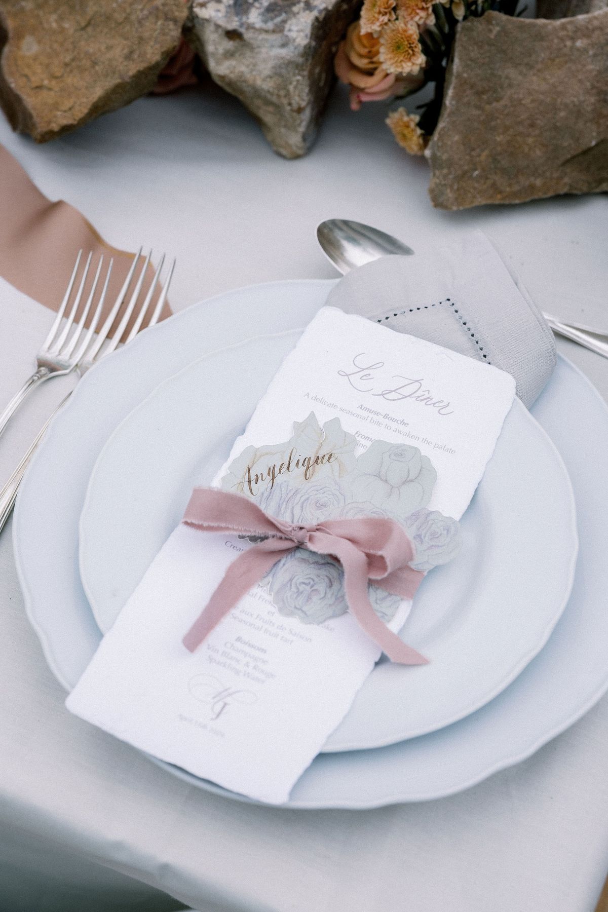 Place setting with Le Dîner menu at Château de Méridon, Île-de-France