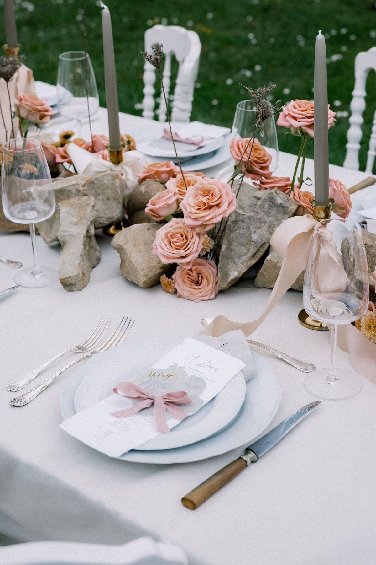 Place settings on outdoor table at Château de Méridon, Île-de-France