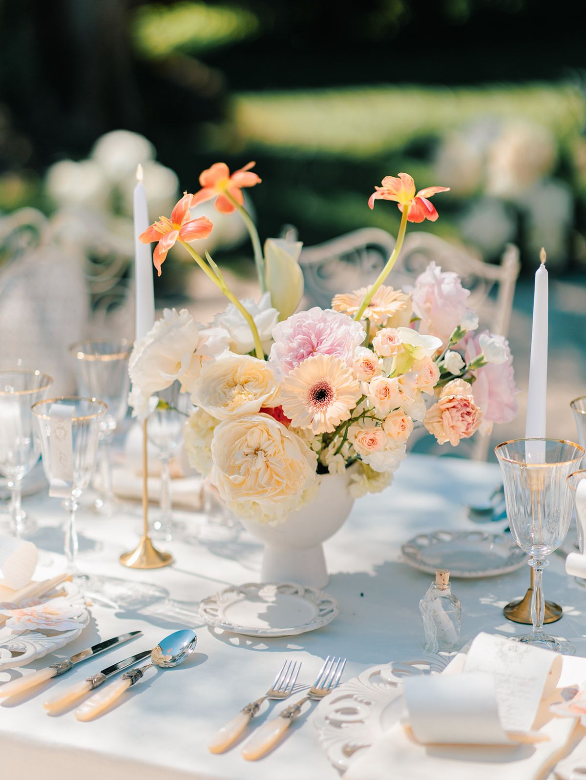 Close view of the tablescape florals and glassware