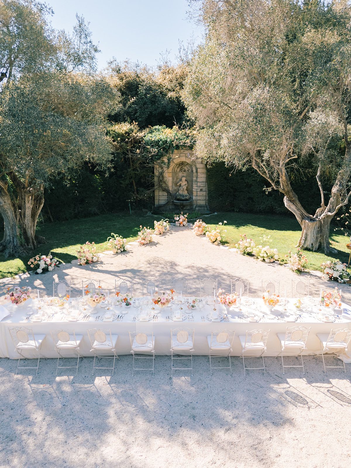 Aerial view of the long garden tables laid for dinner