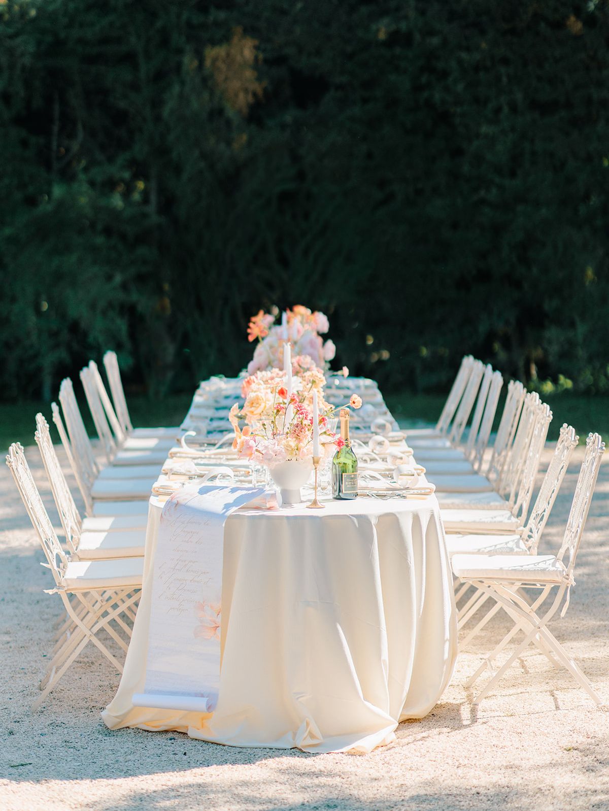 Long tables set for dinner in the garden