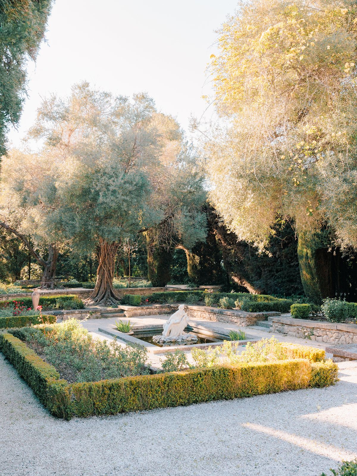 Formal parterre garden and fountain at Bastide du Roy