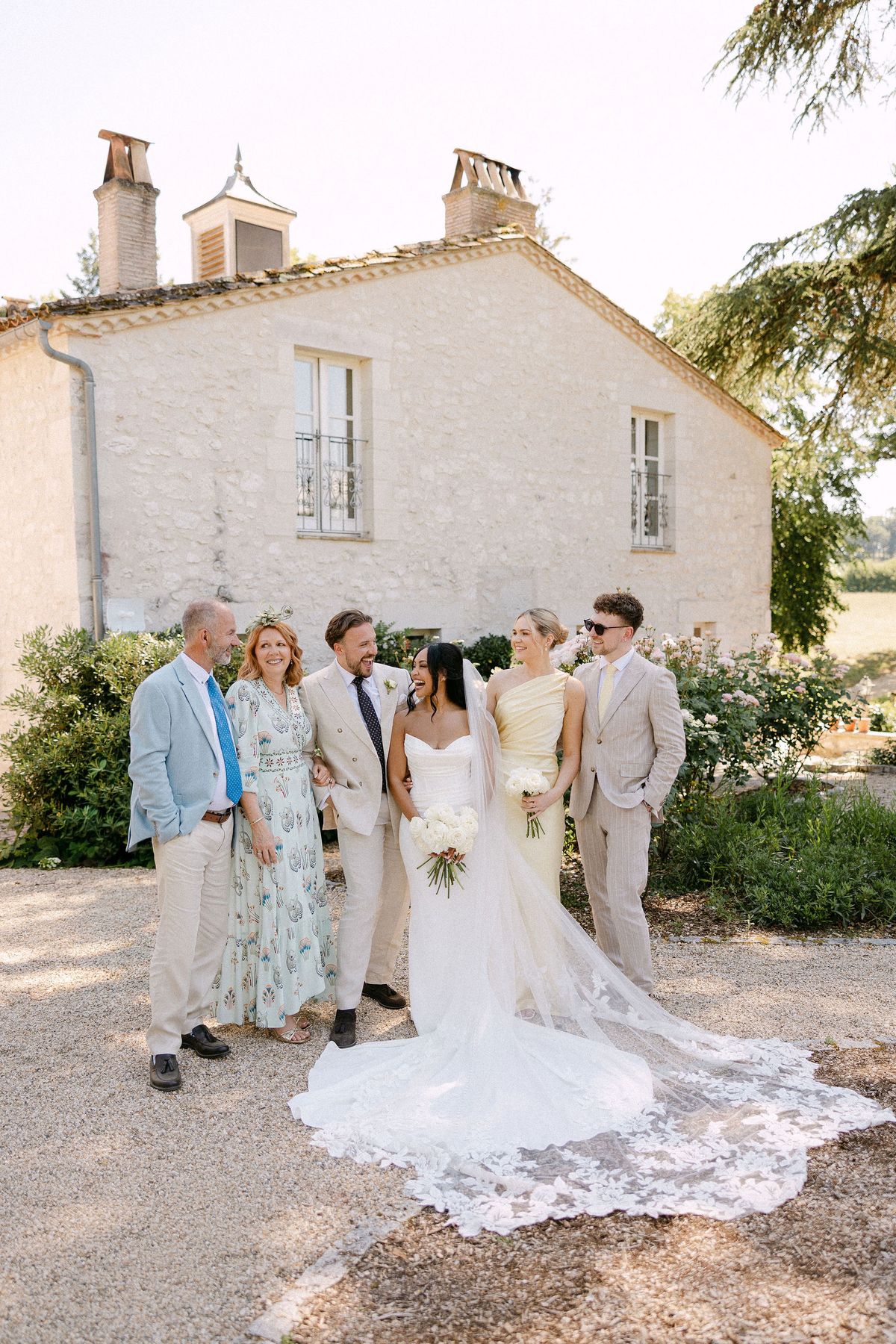 Formal family portrait with the newlyweds