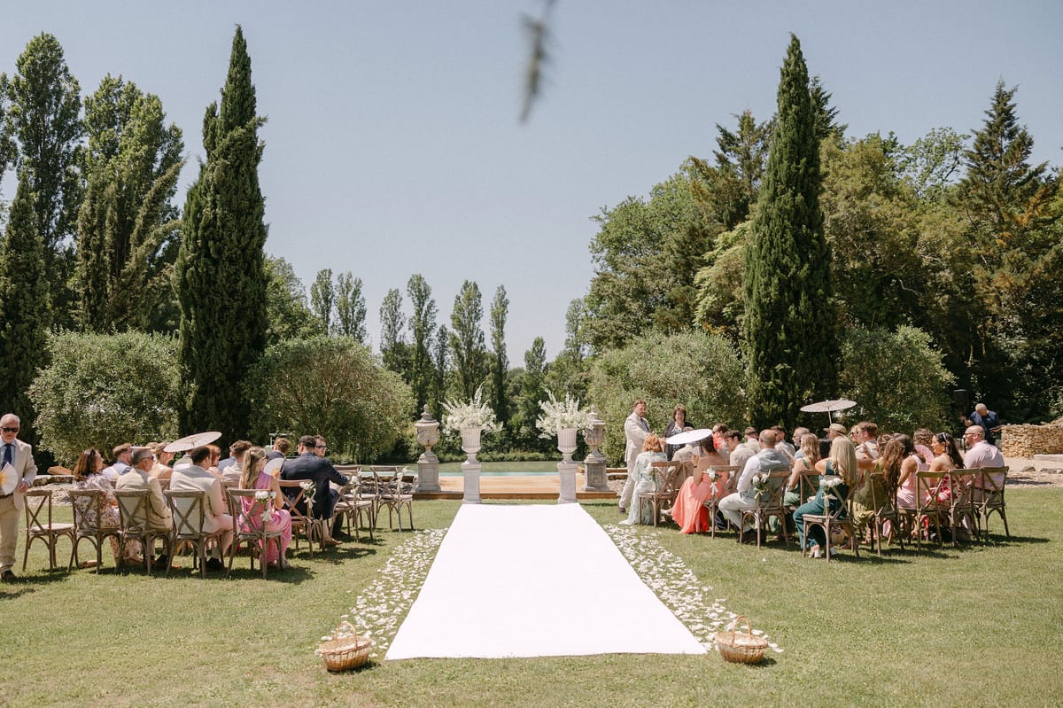 Wide view of the ceremony aisle and seated guests