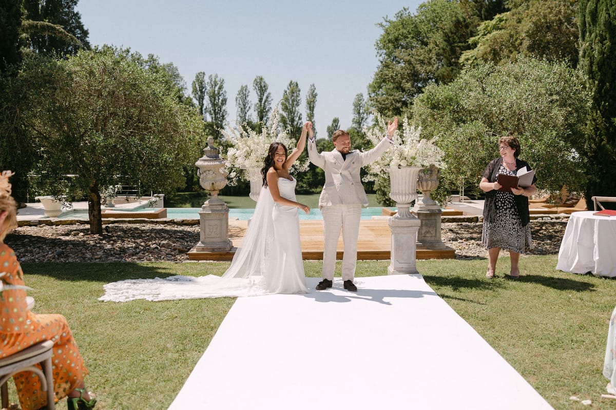 Bride and groom at the altar with the celebrant