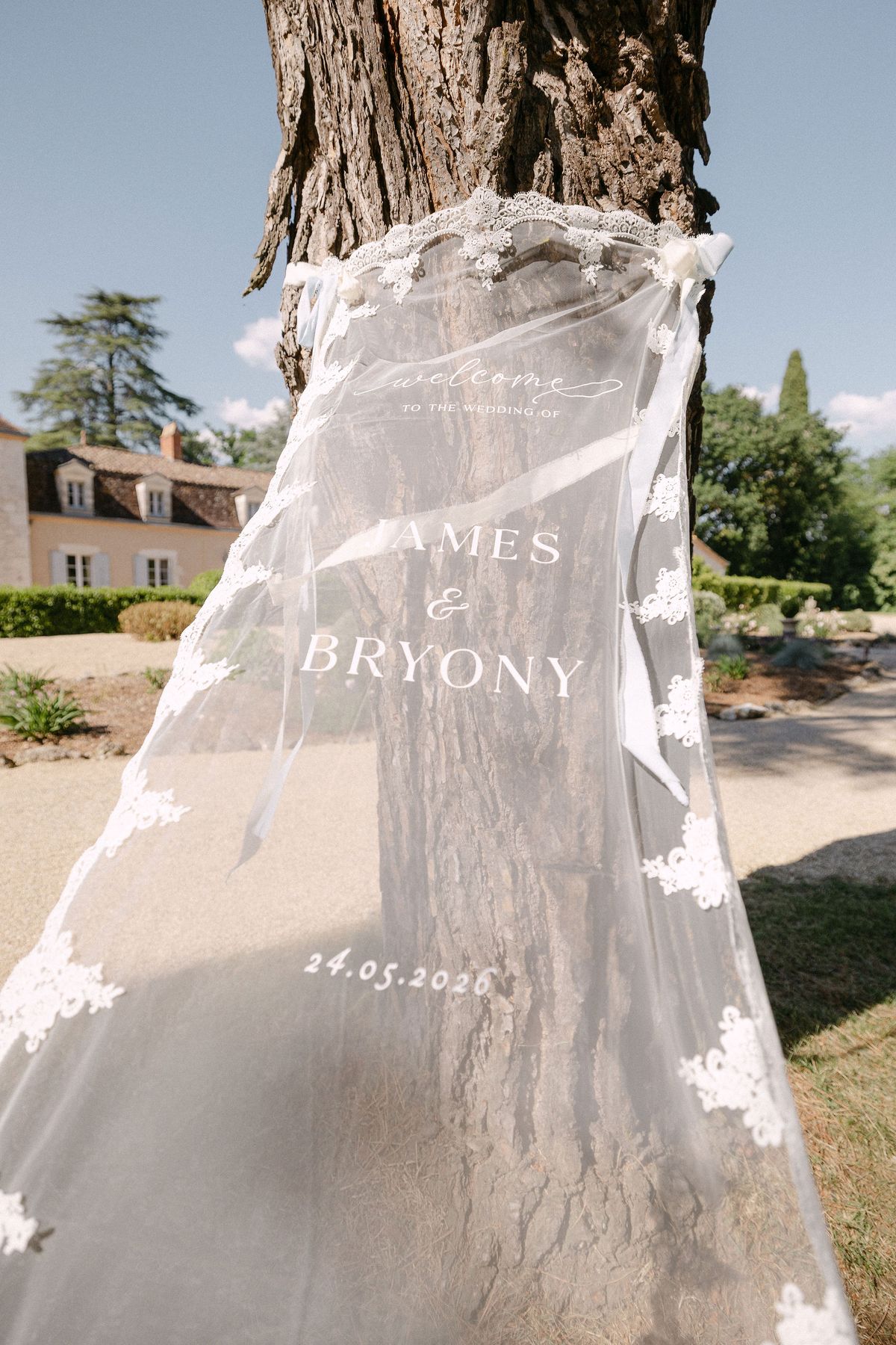Embroidered veil detail reading James & Bryony