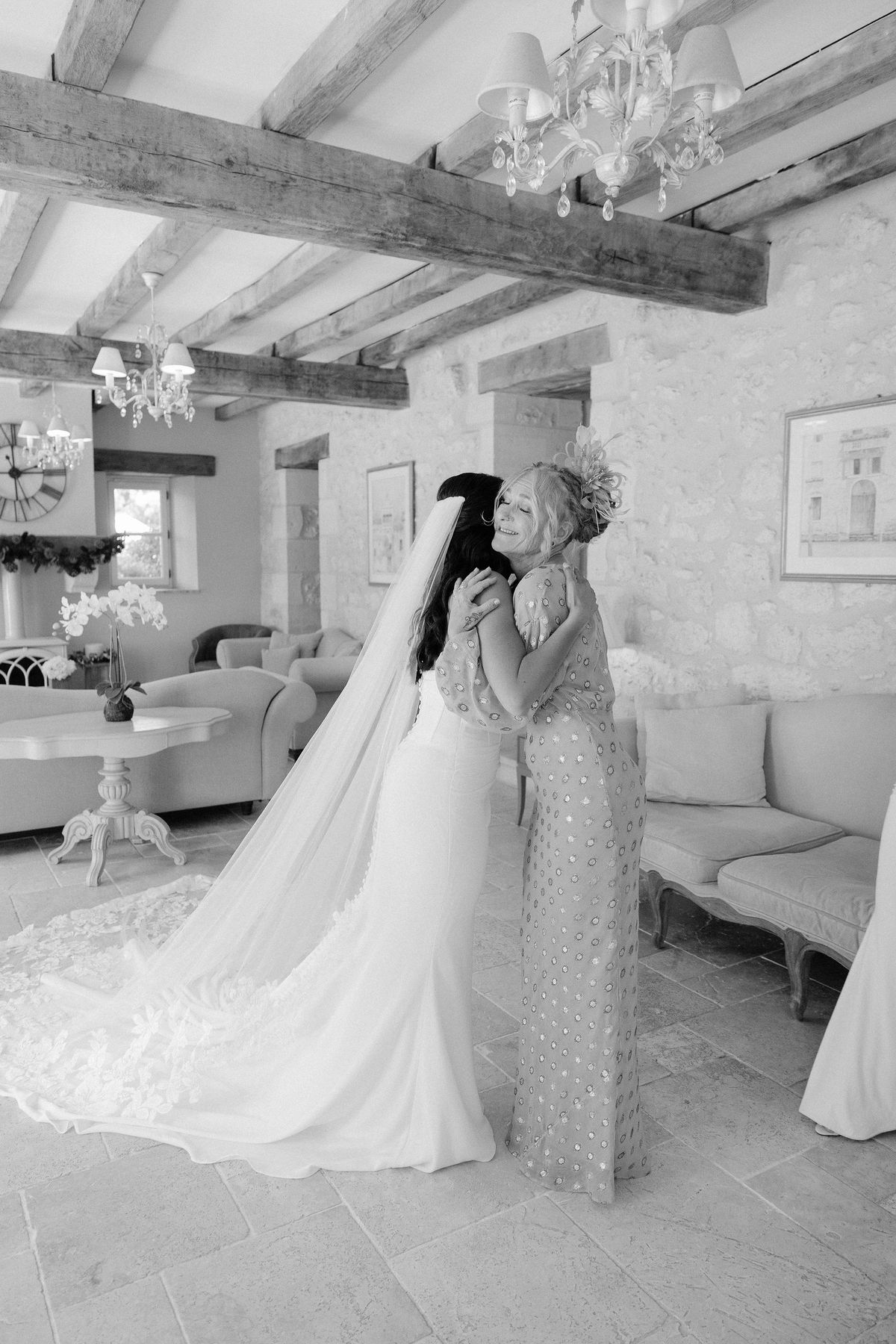 Bride sharing an emotional embrace with her mother