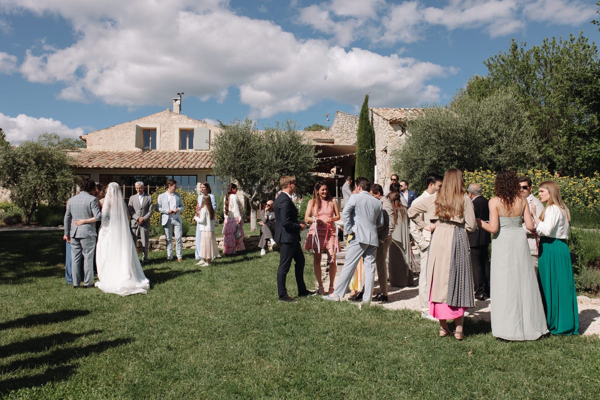 Guests gathered on the lawn at Mas de Florette