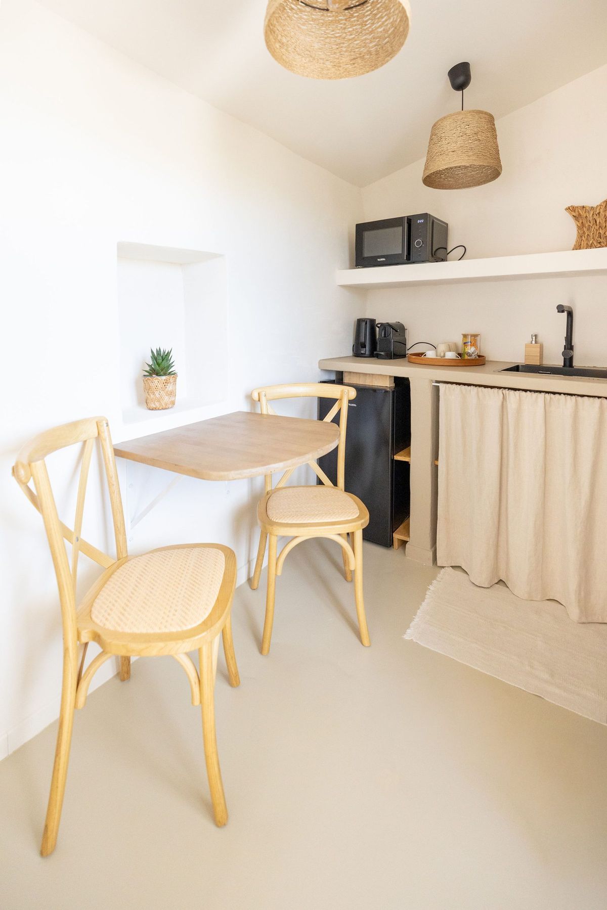 A bedroom kitchenette and dining nook