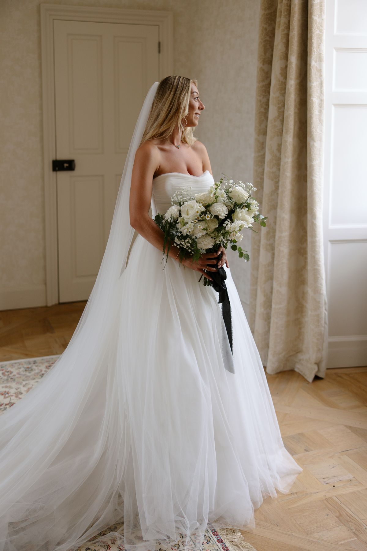 The bride in her Chosen by Khya gown at Chateau de Cazenac in the Dordogne