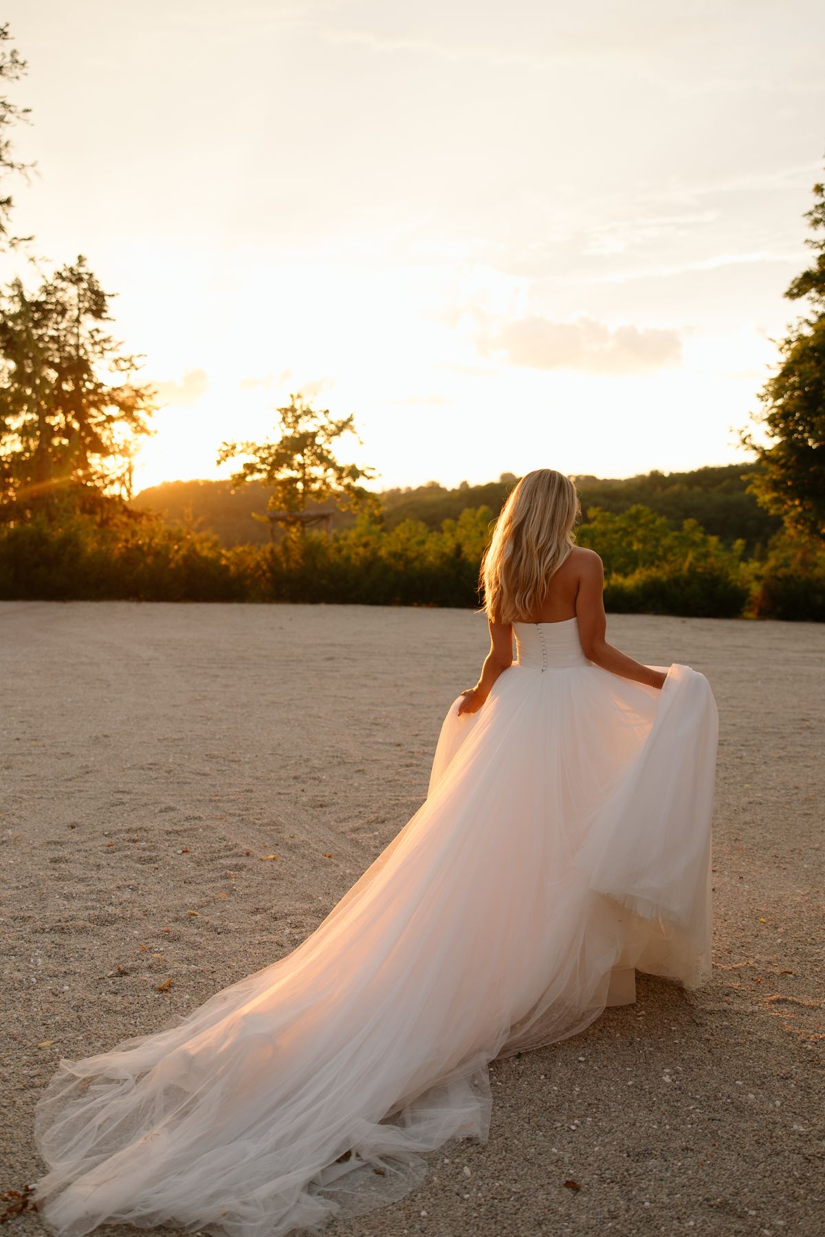 The bride in her Chosen by Khya gown at Chateau de Cazenac in the Dordogne