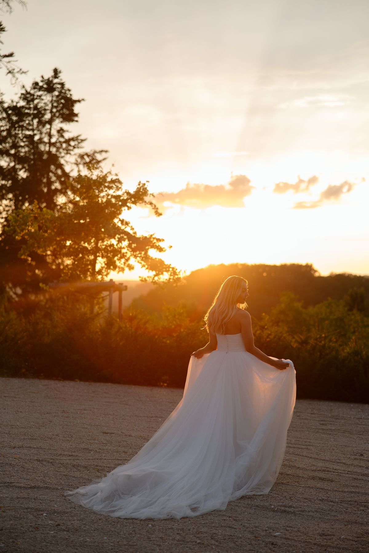 The bride in her Chosen by Khya gown at Chateau de Cazenac in the Dordogne