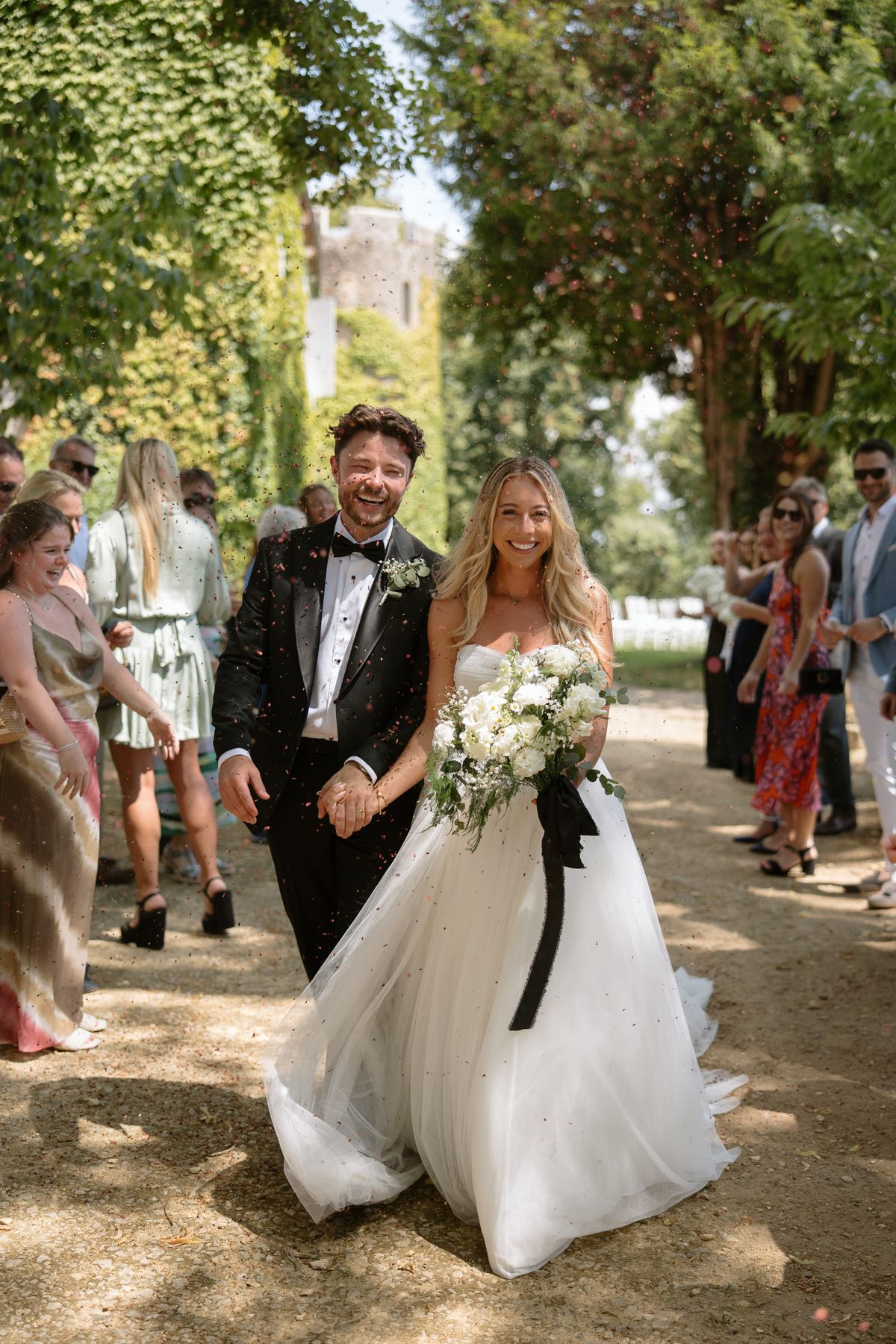Amy and Oscar's outdoor ceremony on the garden terrace at Chateau de Cazenac in the Dordogne