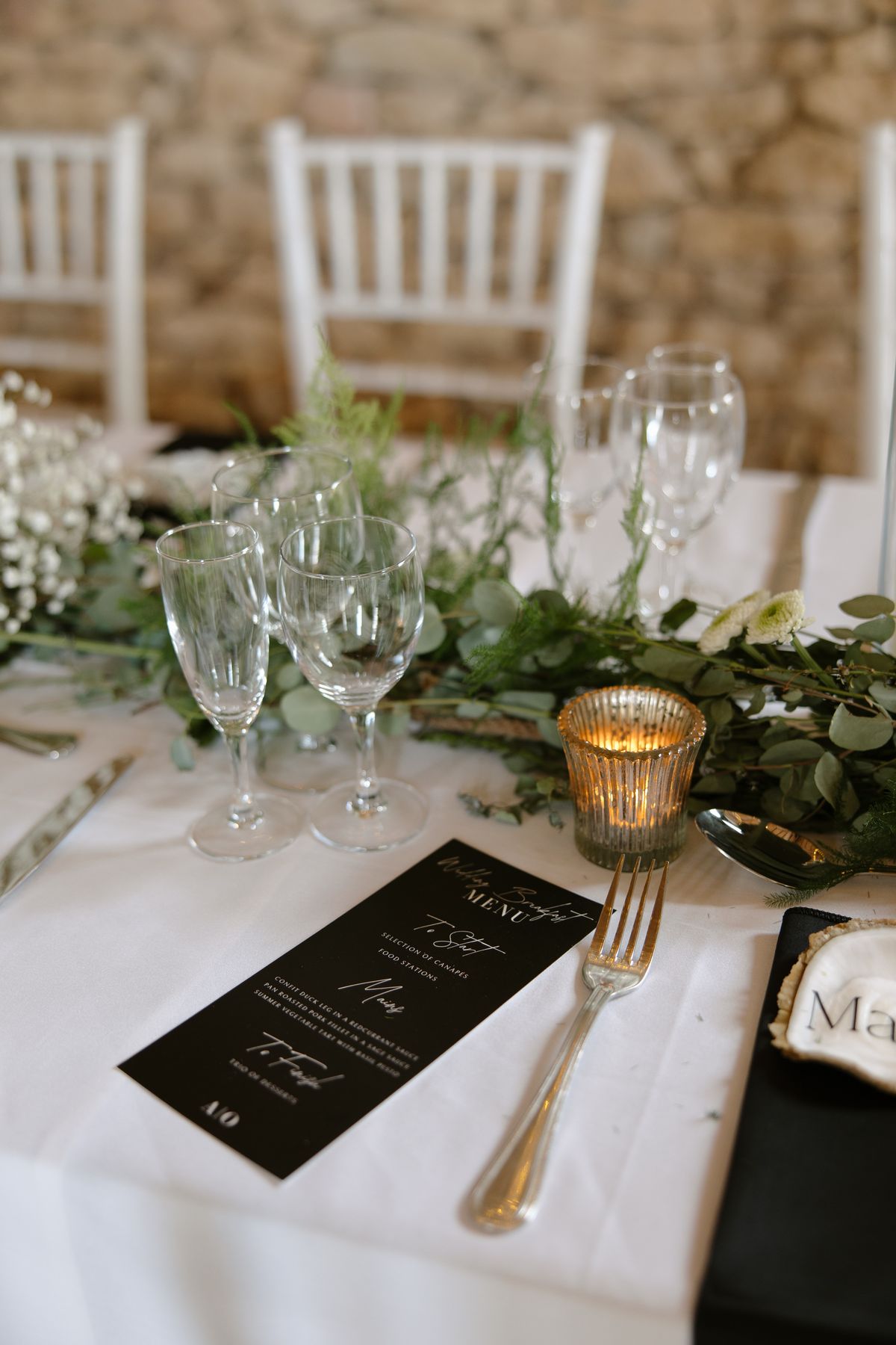 Table styling and details from Amy and Oscar's summer wedding at Chateau de Cazenac in the Dordogne