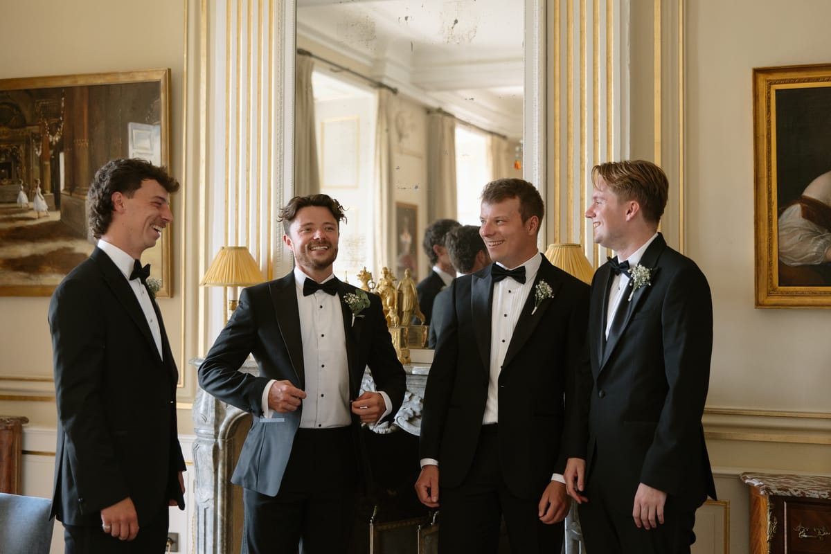 Amy and Oscar getting ready before their summer wedding at Chateau de Cazenac in the Dordogne