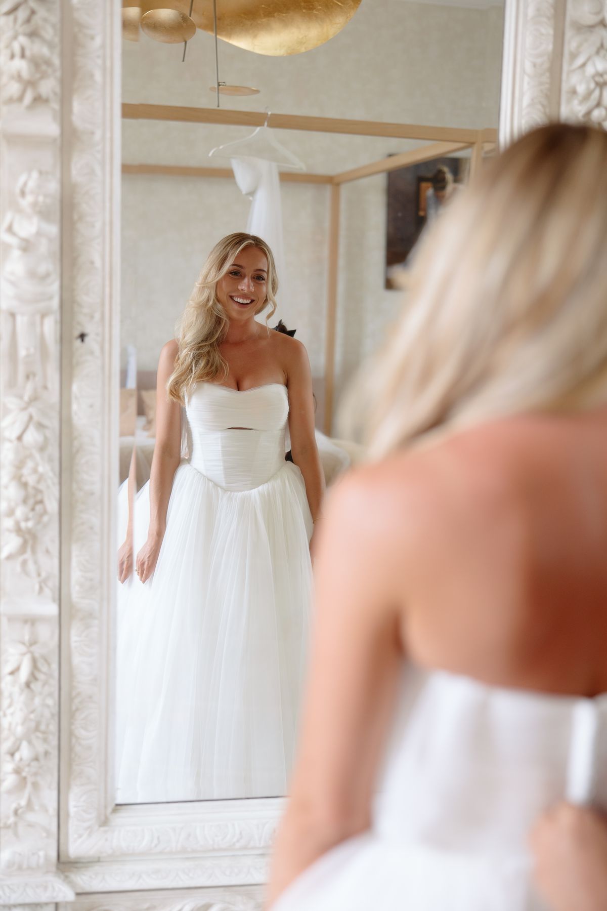 Amy and Oscar getting ready before their summer wedding at Chateau de Cazenac in the Dordogne