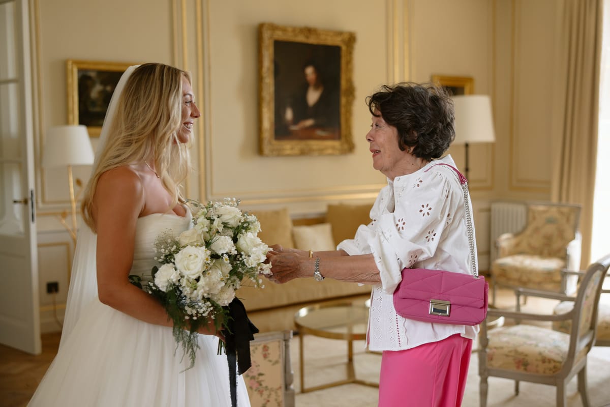 Amy and Oscar getting ready before their summer wedding at Chateau de Cazenac in the Dordogne