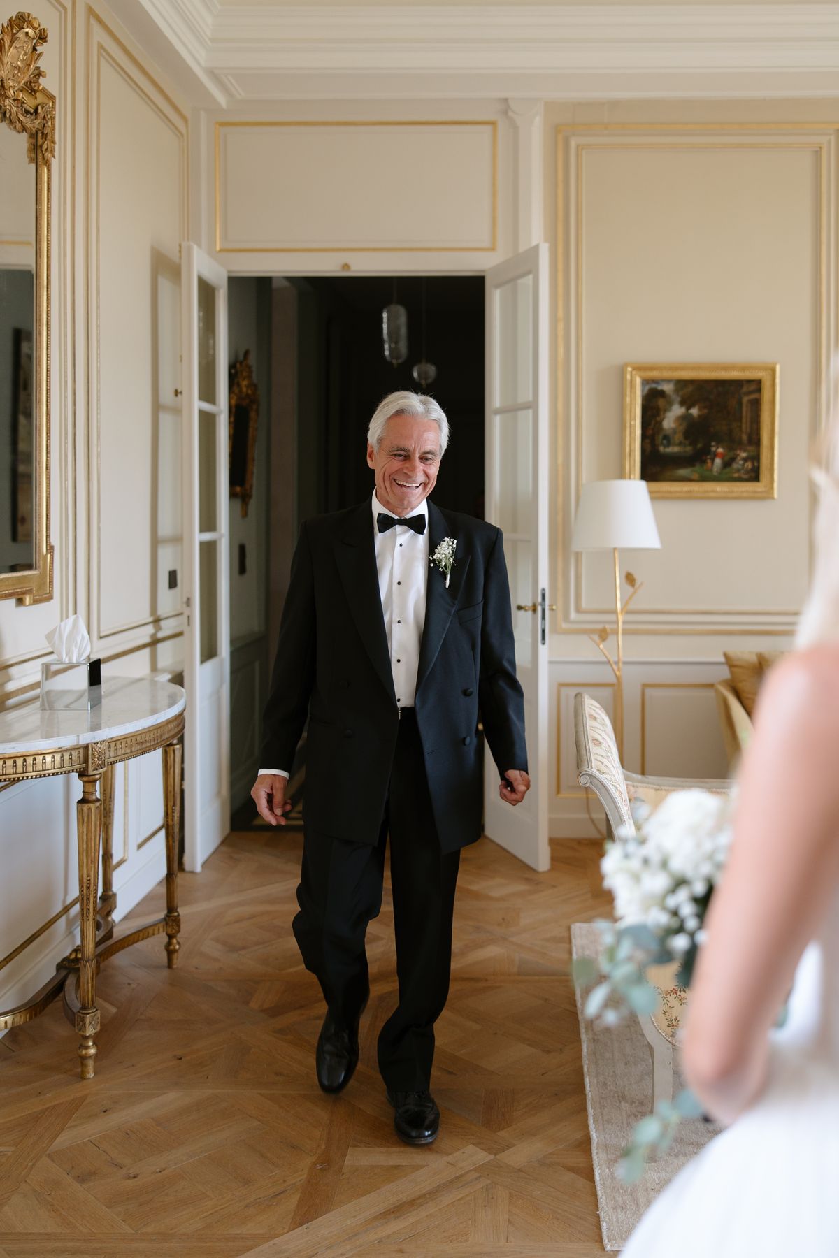 Amy and Oscar getting ready before their summer wedding at Chateau de Cazenac in the Dordogne