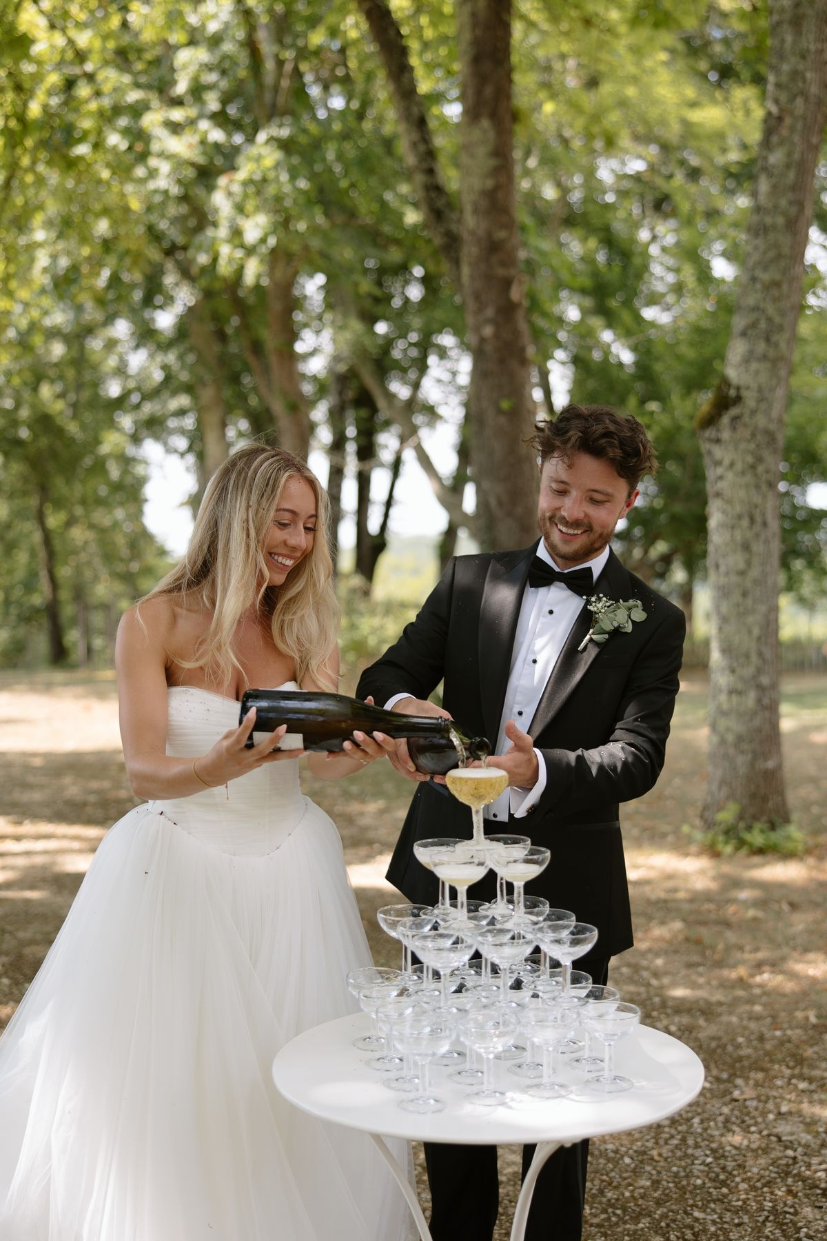 The vin d'honneur at Amy and Oscar's summer wedding at Chateau de Cazenac in the Dordogne
