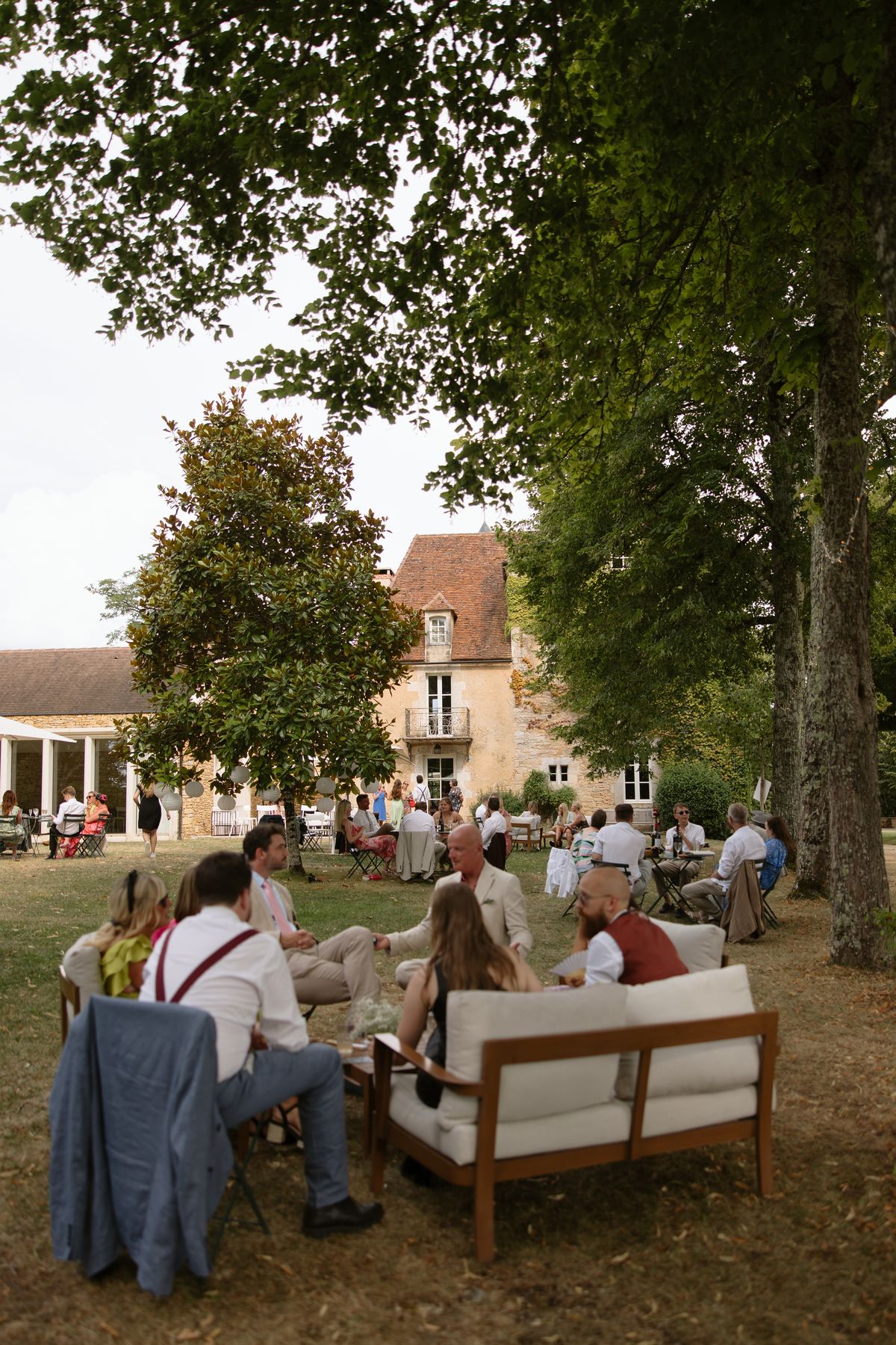 The vin d'honneur at Amy and Oscar's summer wedding at Chateau de Cazenac in the Dordogne