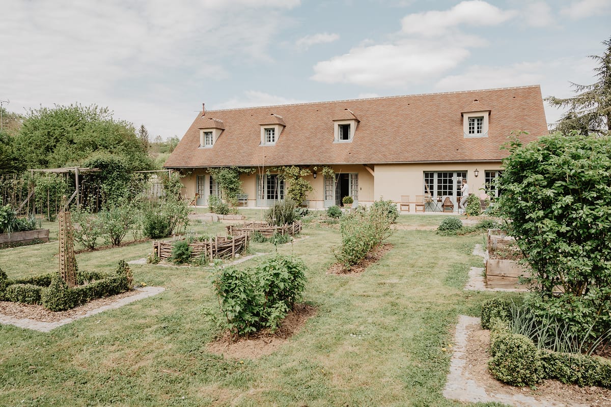 Exterior of a secondary property building overlooking the kitchen garden