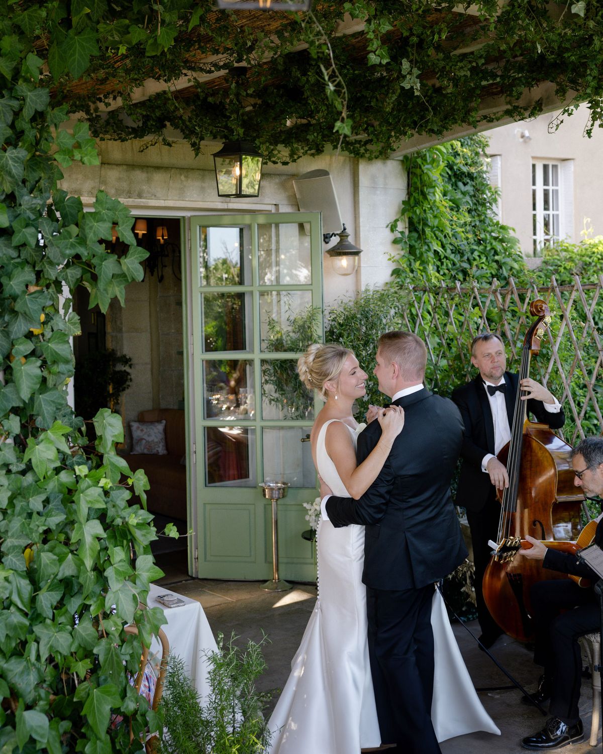 First dance by the glazed doors with a double bass player