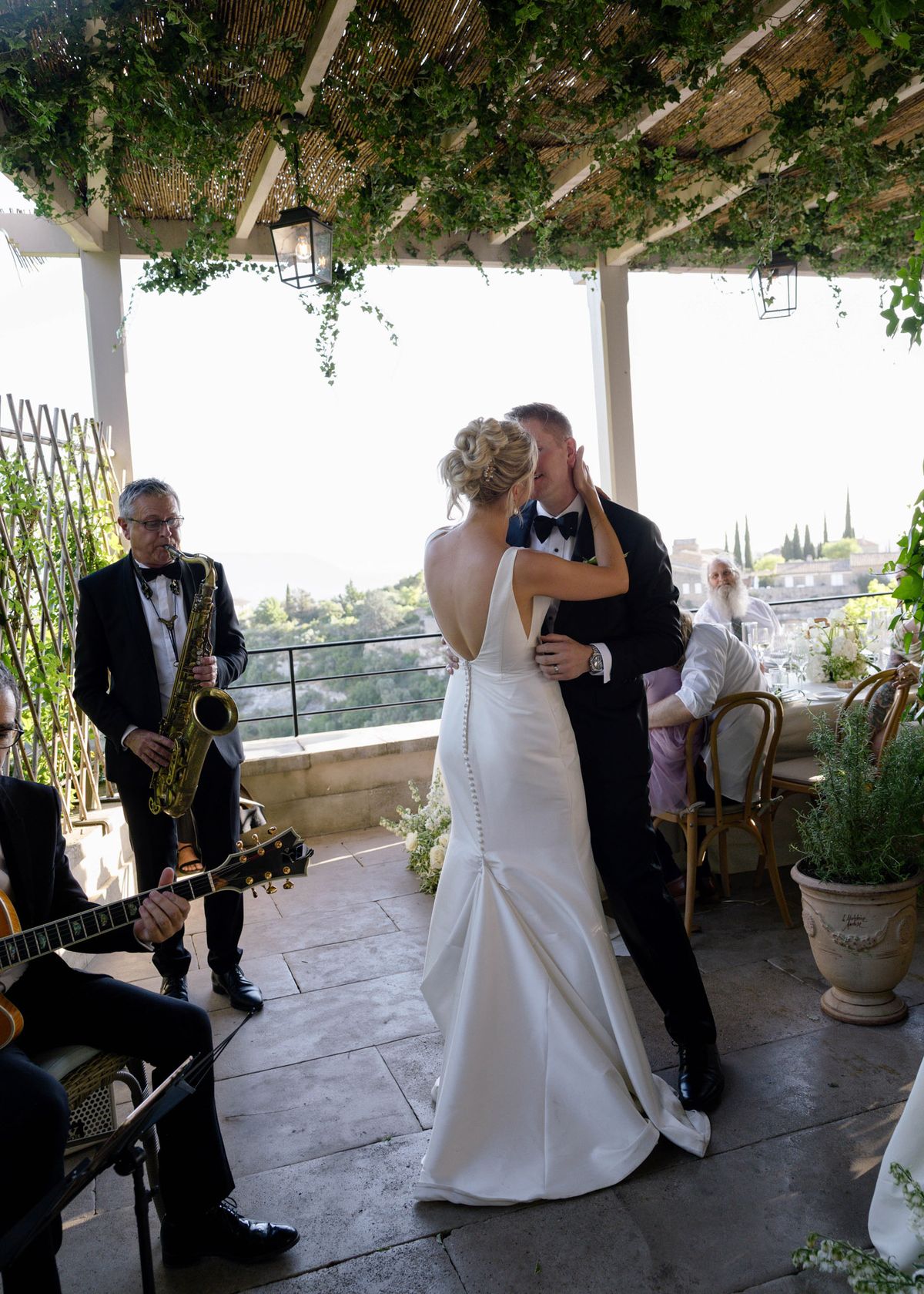 First dance on the terrace with a saxophonist playing