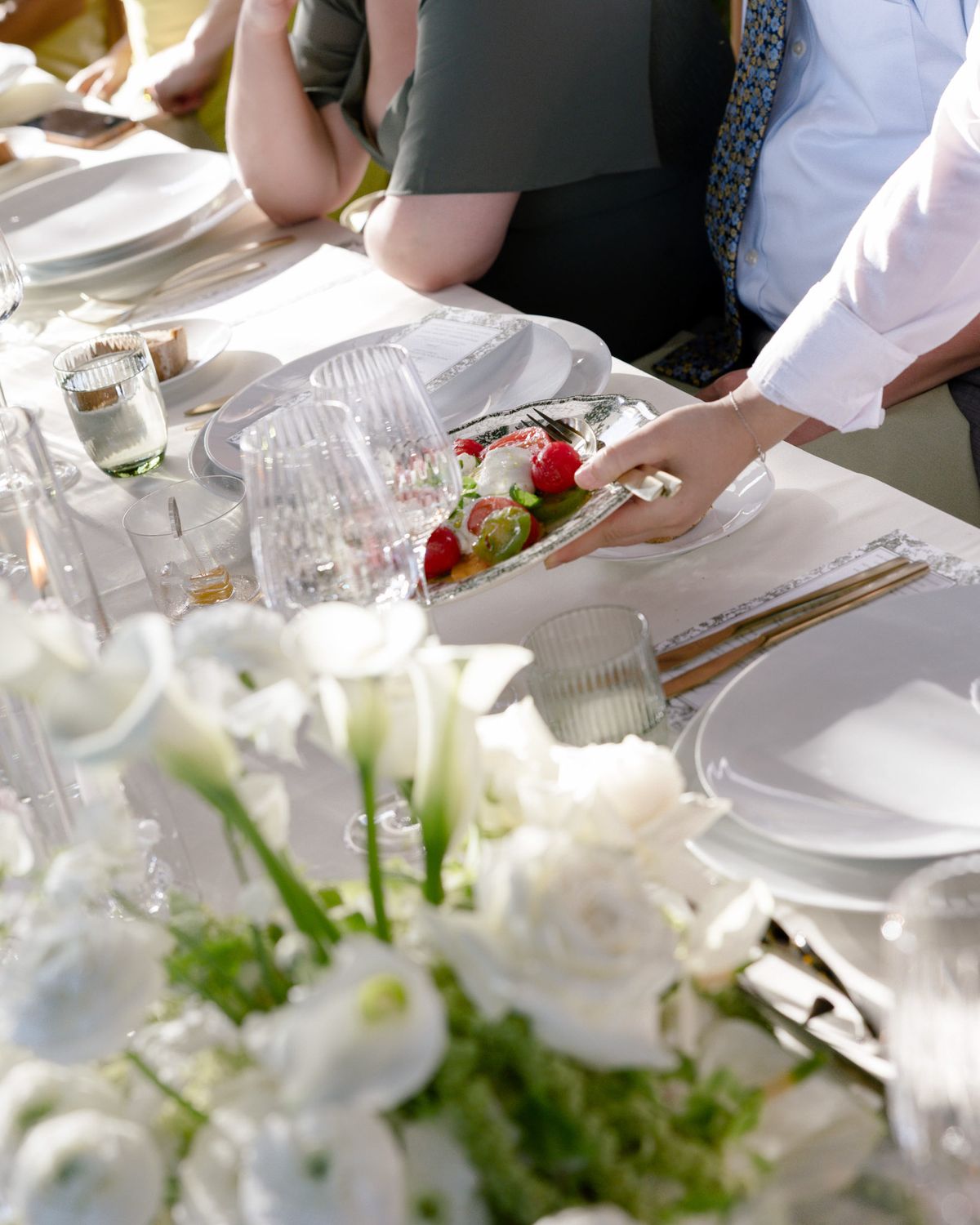 Dinner being served at the long table