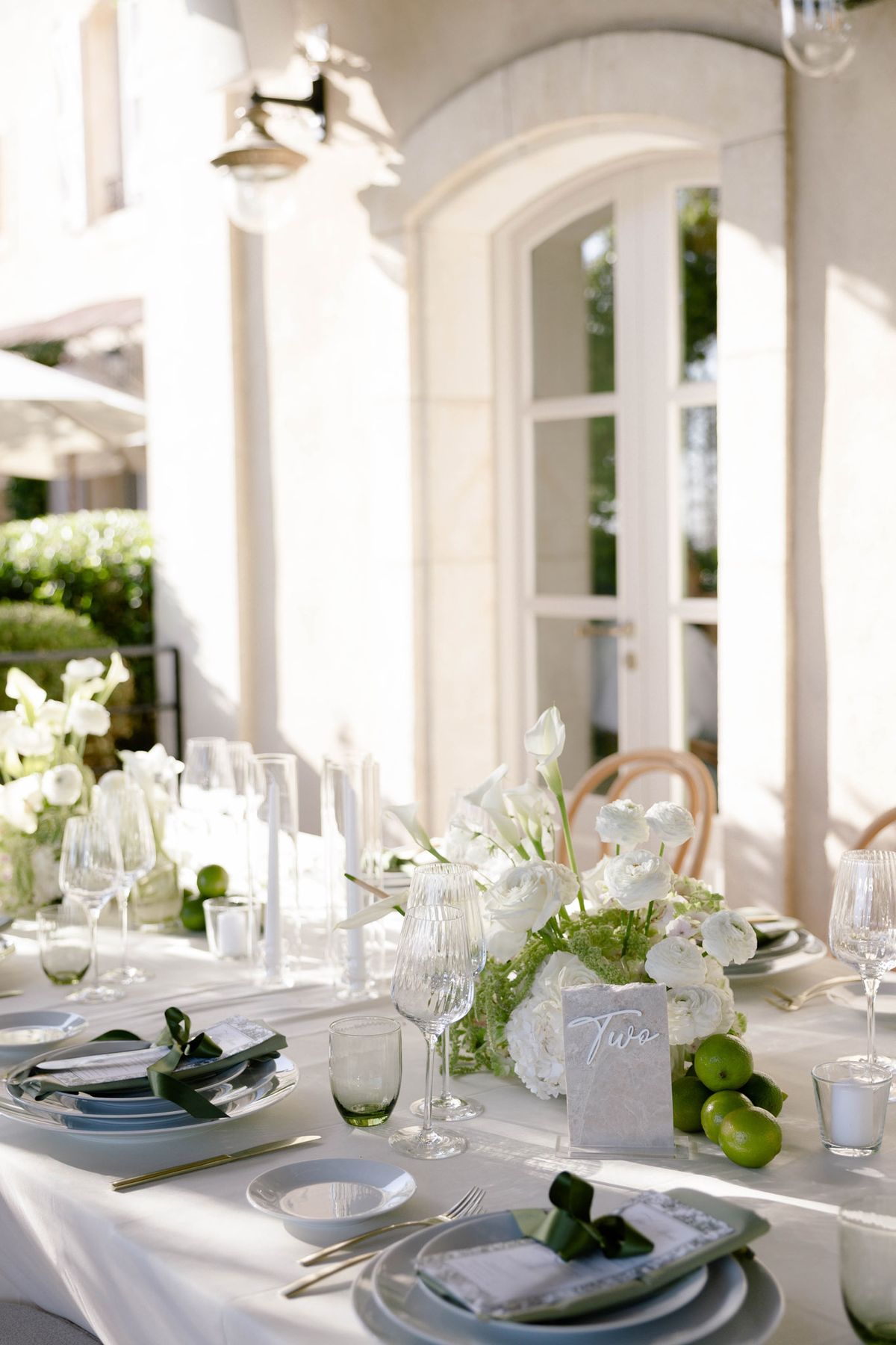 Place setting with limes on the dinner table