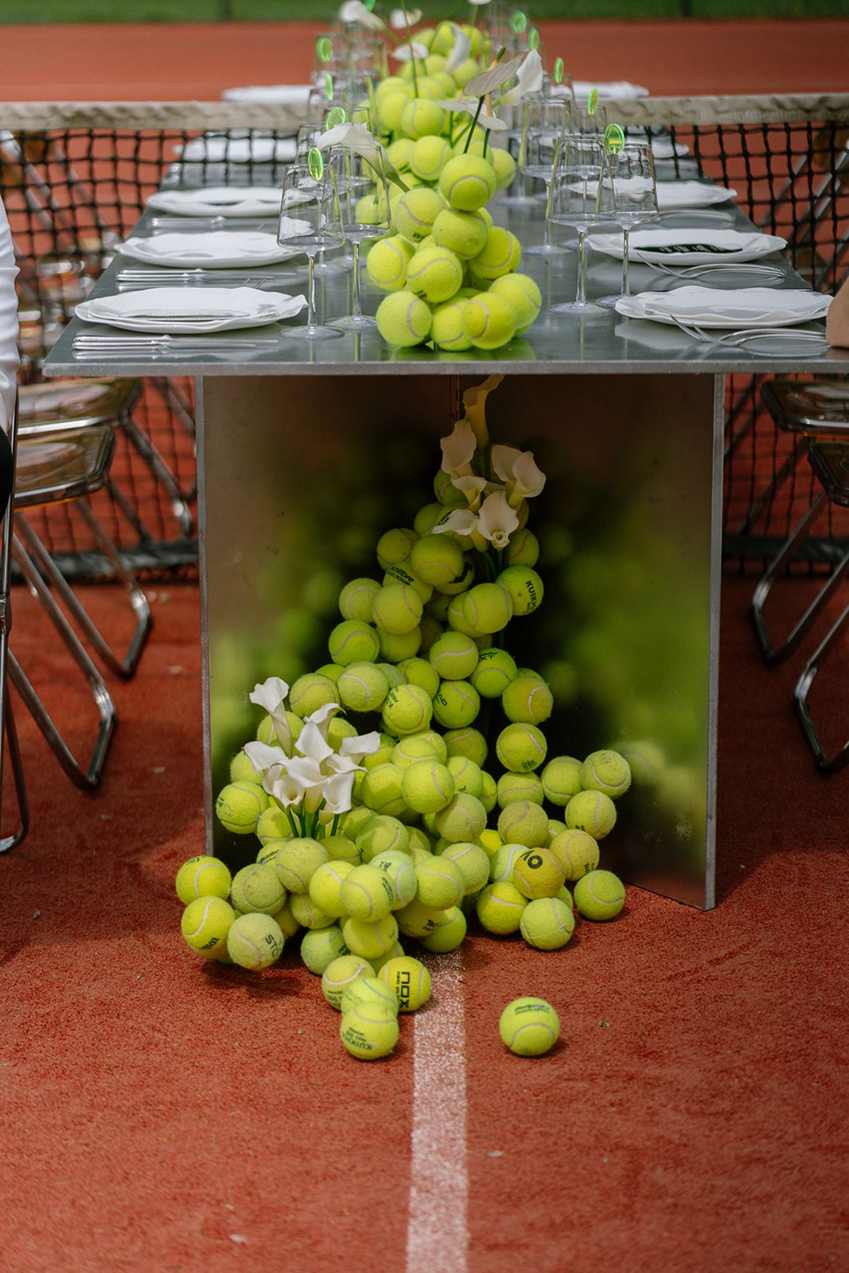 Overhead detail of the bar cart with tennis balls