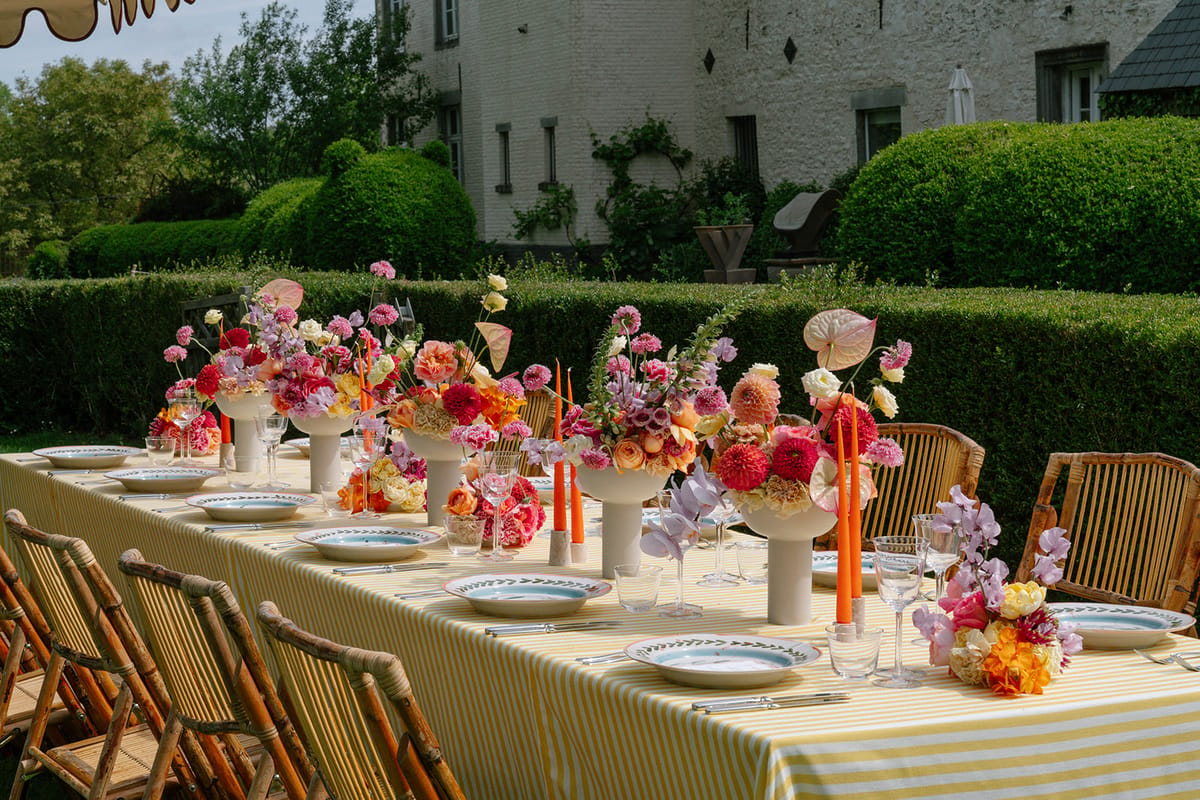 Reception table setting with the chateau in the background
