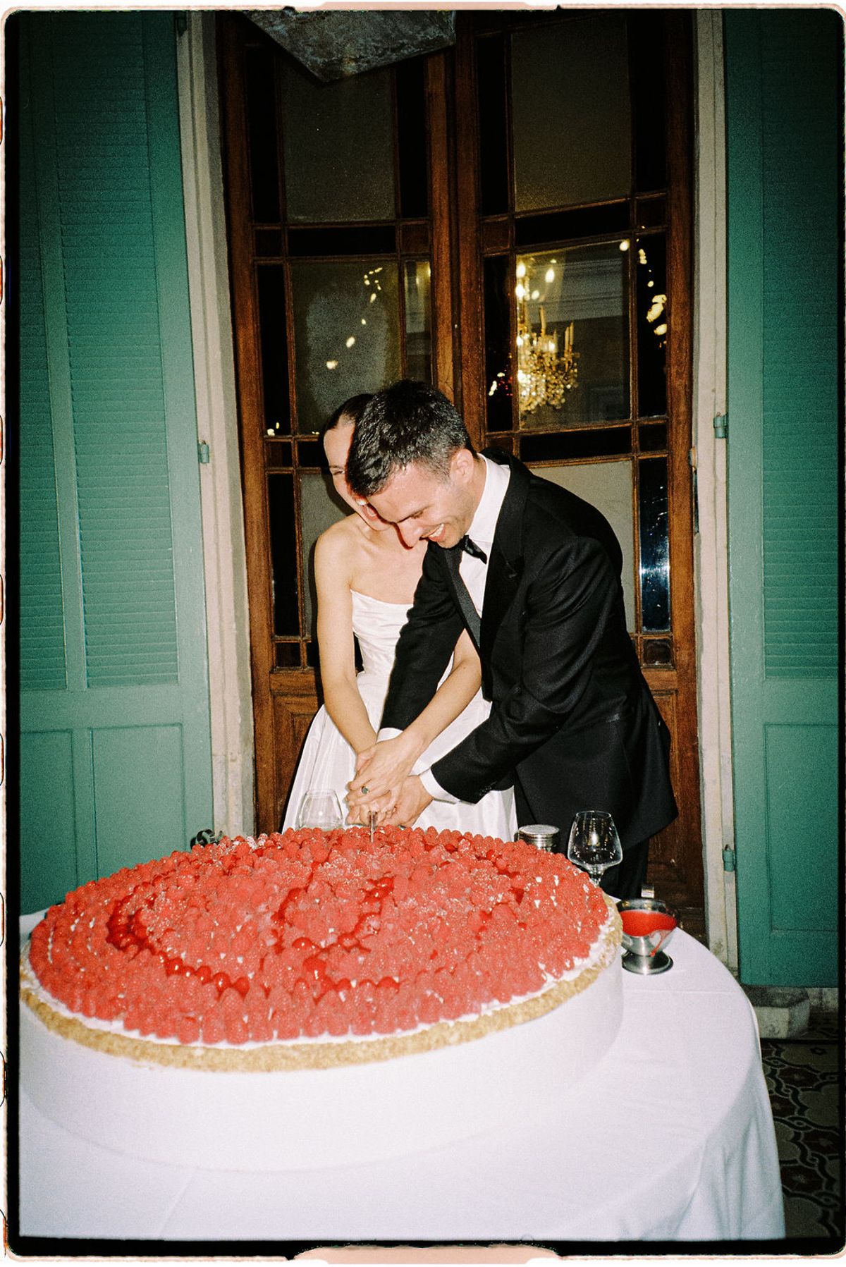 Clara and Constantin cut the wedding cake together