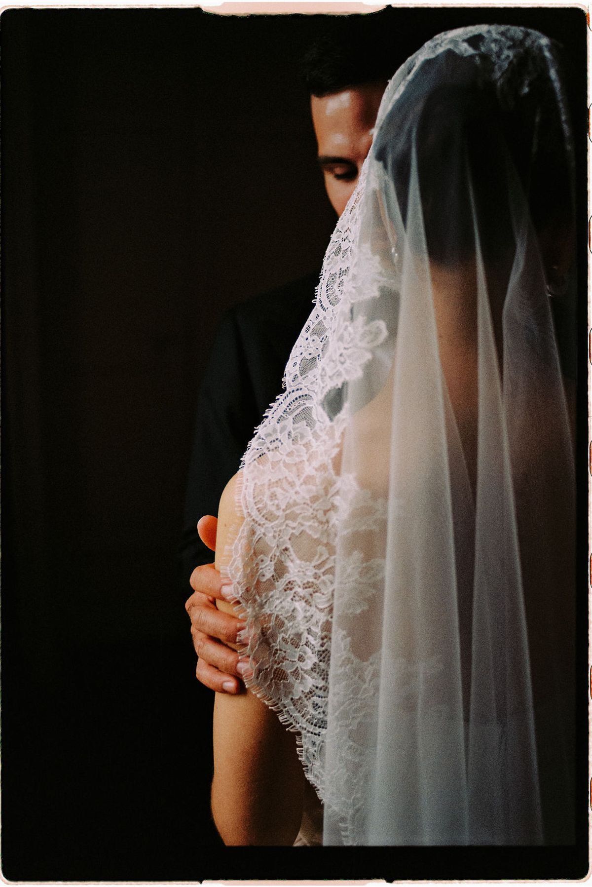 A close view of Clara's veil in warm light