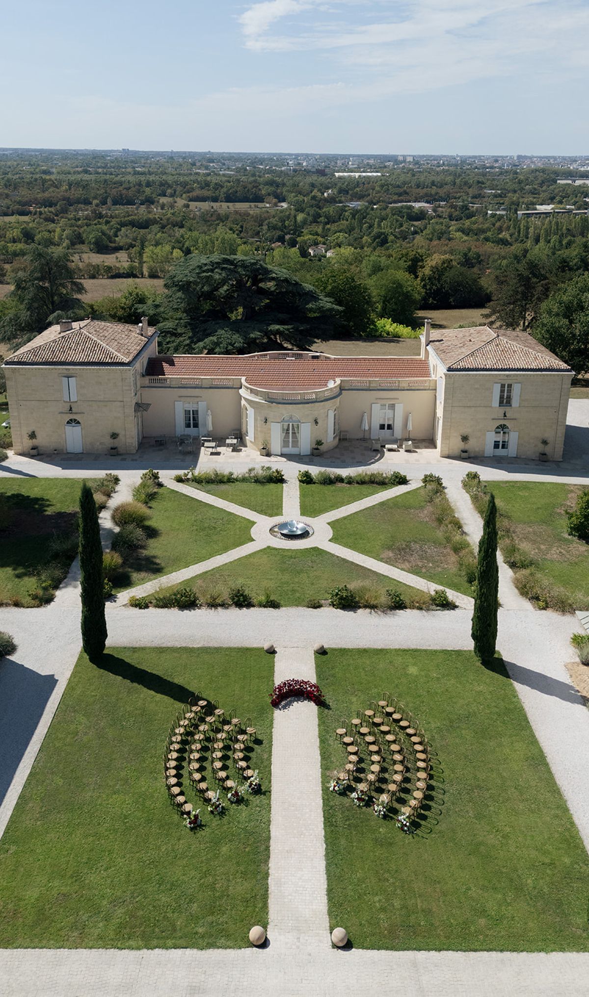Aerial view of Château Gassies, its formal gardens and the bow-tie ceremony seating