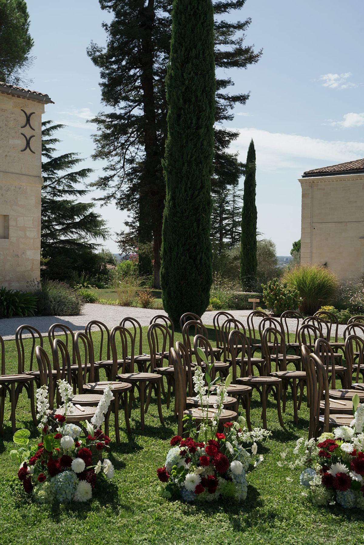 Red, white and blue arrangements at the ends of the ceremony rows