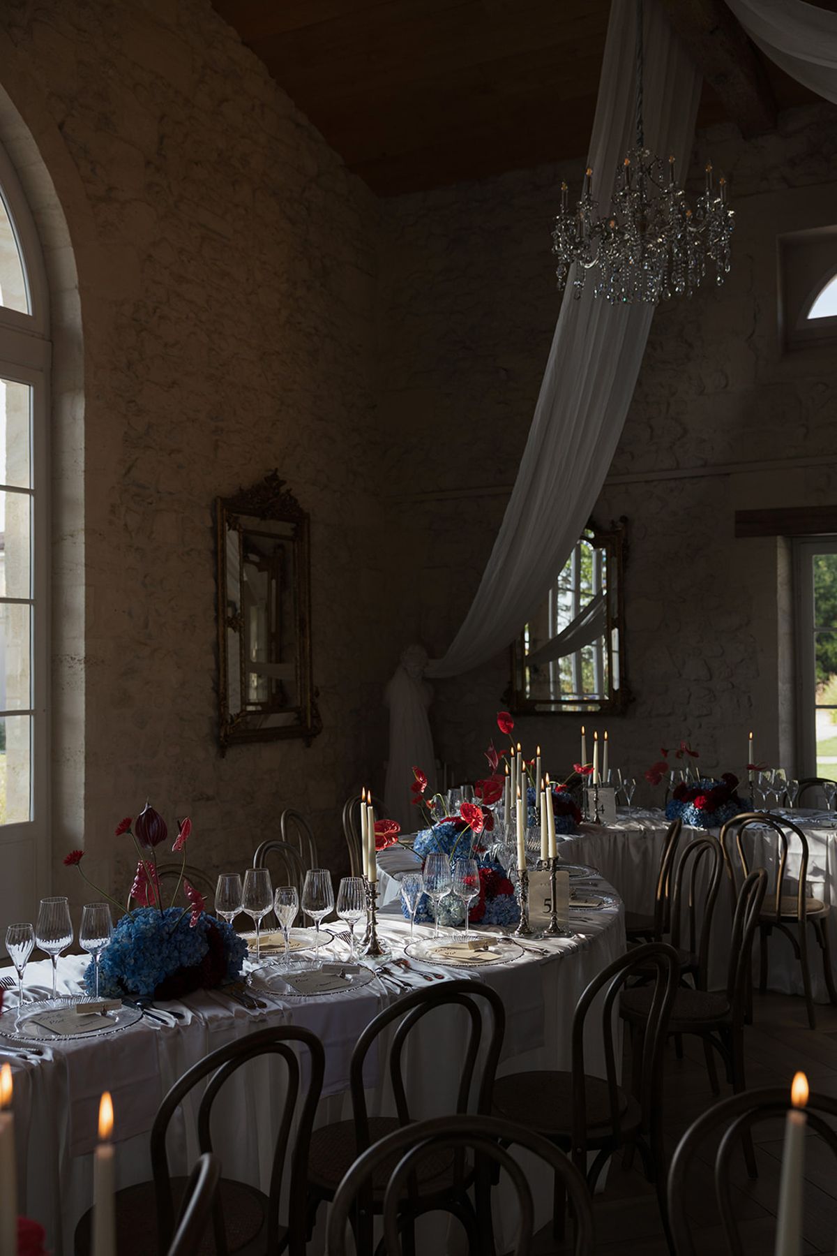 Candlelit tables in the draped reception room